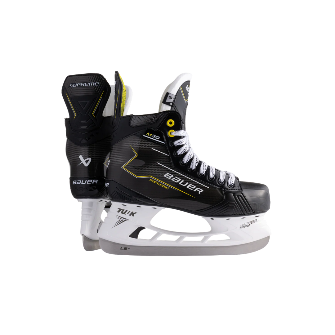 Pair of Bauer M30 Intermediate and Senior sized hockey skates.
