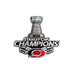 An embroidered patch celebrating the 2025 Stanley Cup Champions, featuring the Stanley Cup trophy, the text '2026 STANLEY CUP CHAMPIONS,' and the Carolina Hurricanes logo at the bottom.